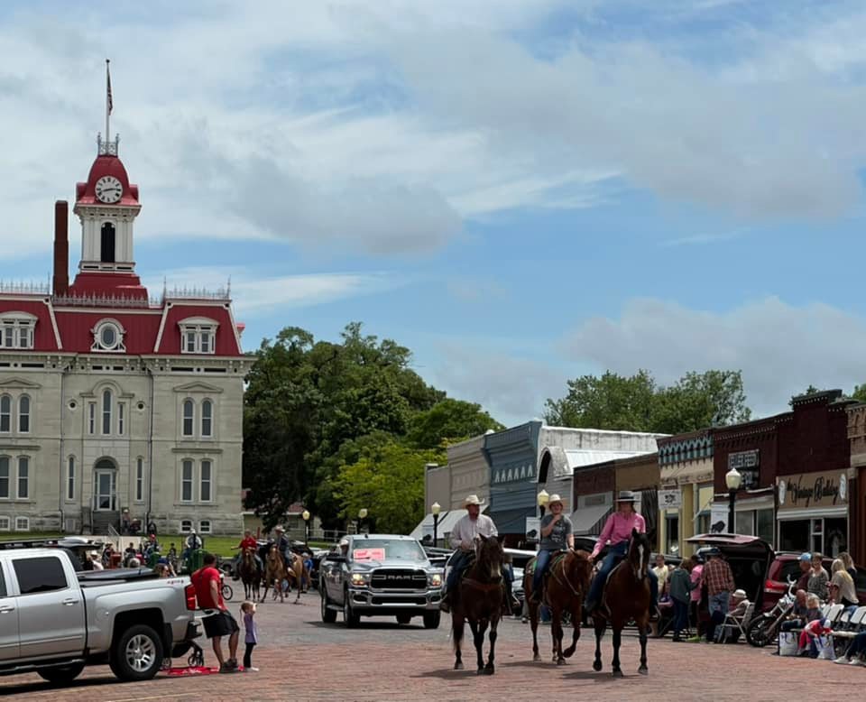 Flint Hills Rodeo Parade as it winds through downtown Cottonwood Falls, Kansas Flint Hills Rodeo Parade as it winds through downtown Cottonwood Falls, Kansas